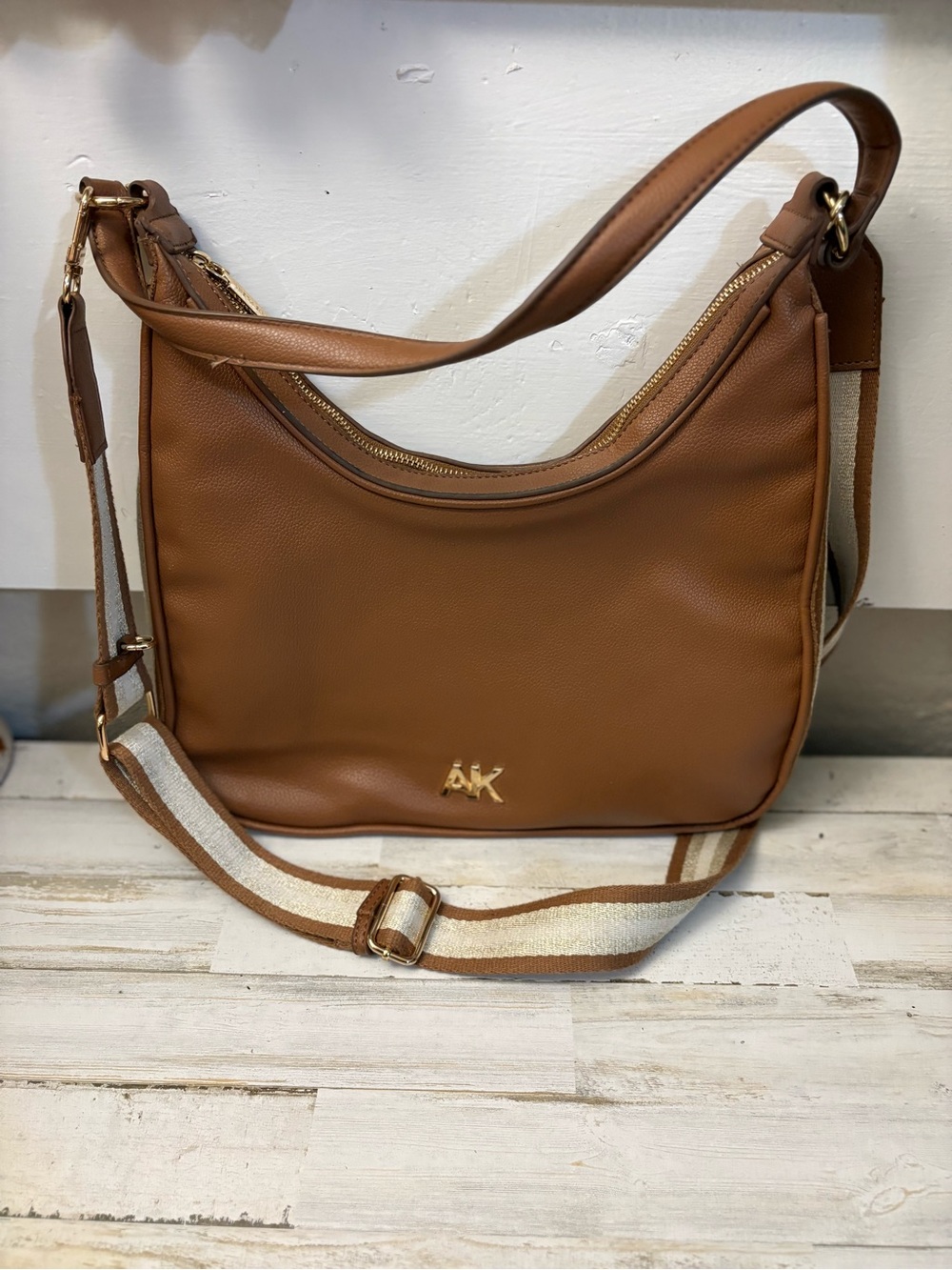 Anne Klein Tan Pebble Leather Crossbody with Striped Strap